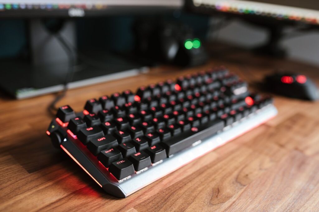 7 Best Gaming Keyboard and Mouse Combos (2026) 2 Best gaming keyboard and mouse combos — gaming keyboard and mouse with red backlighting on a desk